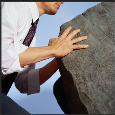 Power From Positive Affirmation-Man pushing a boulder